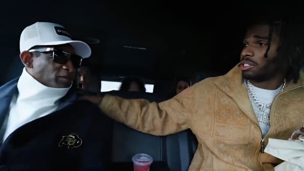 Shedeur Sanders talking to his dad in a car